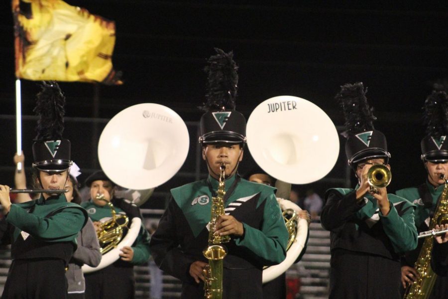 Schuyler band students performing during a home football game.