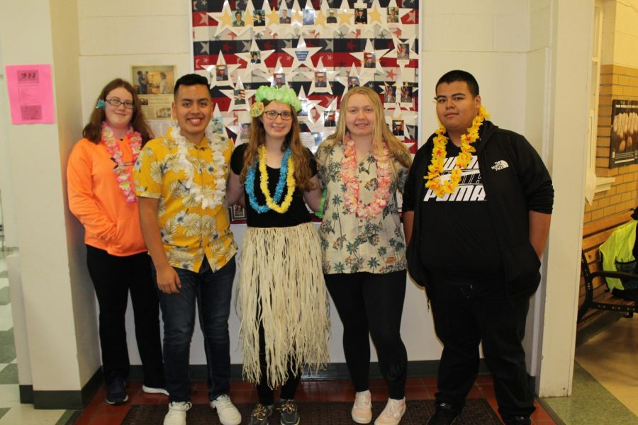 Students dressed up with a Hawaiian theme.