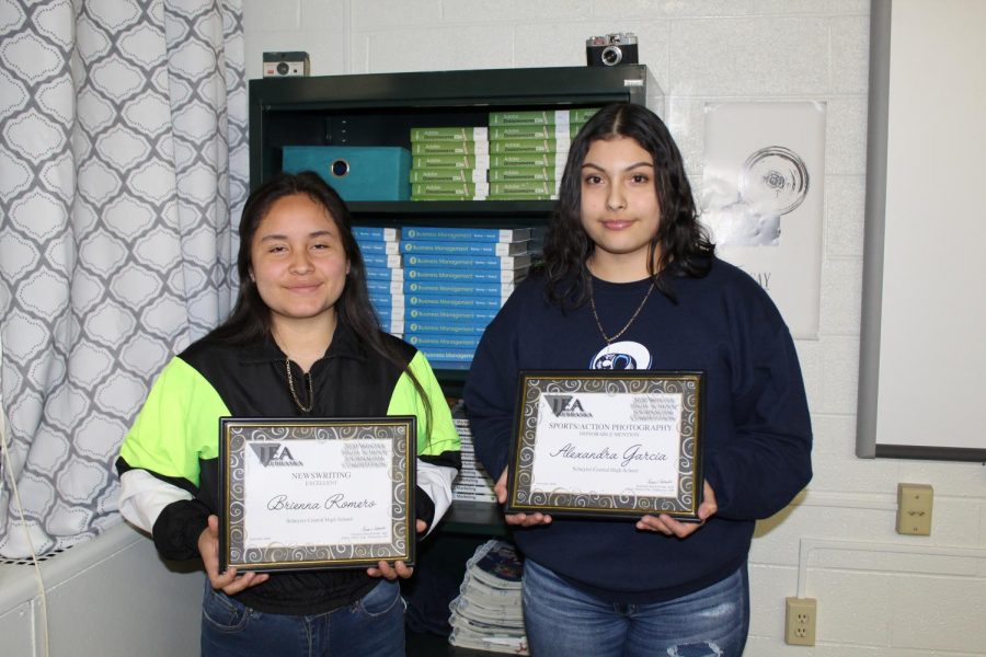 Brienna Romero and Alexandra Garcia holding their certificates. 