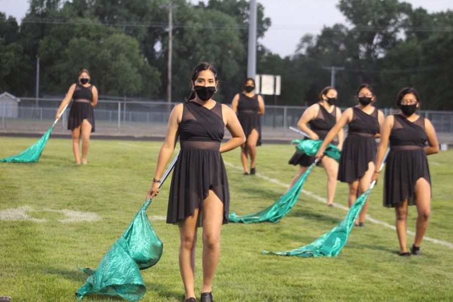The Color Guard team performs.