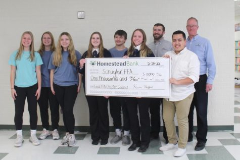 The FFA team accepting their award from the Homestead Bank.
