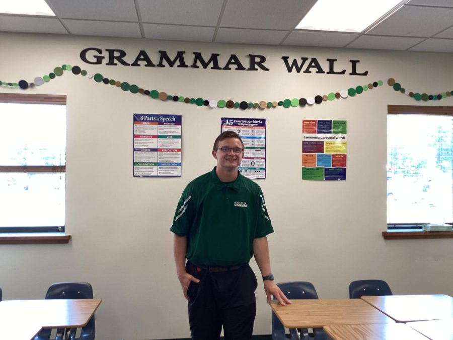 Mr. Cover in his classroom ready to greet his students.