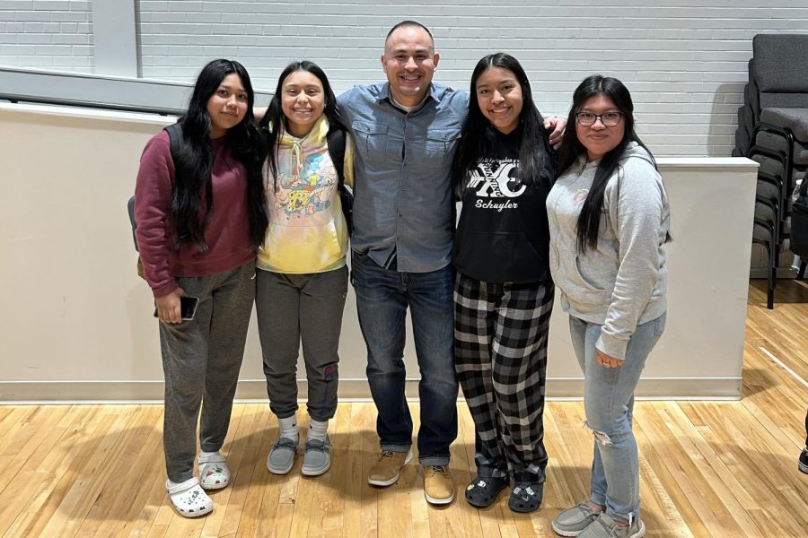Students posing with Juan Cangas.