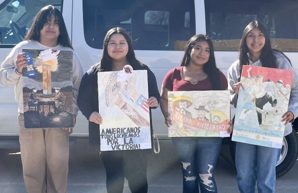 Esmeralda Munoz, Diana Peralta, Genesis Borja, and Amy Delacruz presenting there posters. 