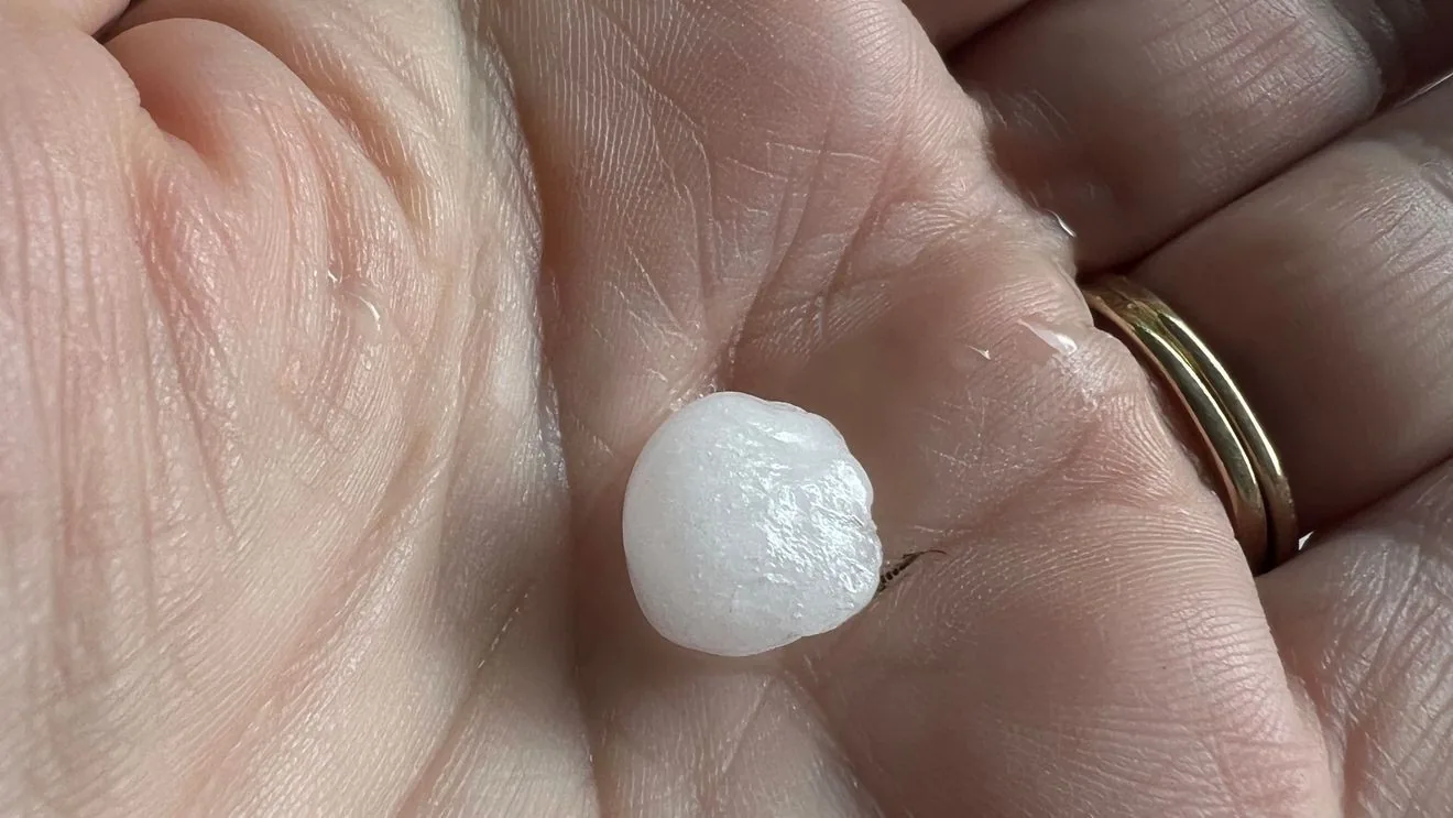 Dark thunderstorm clouds over Utah with a severe weather alert in effect