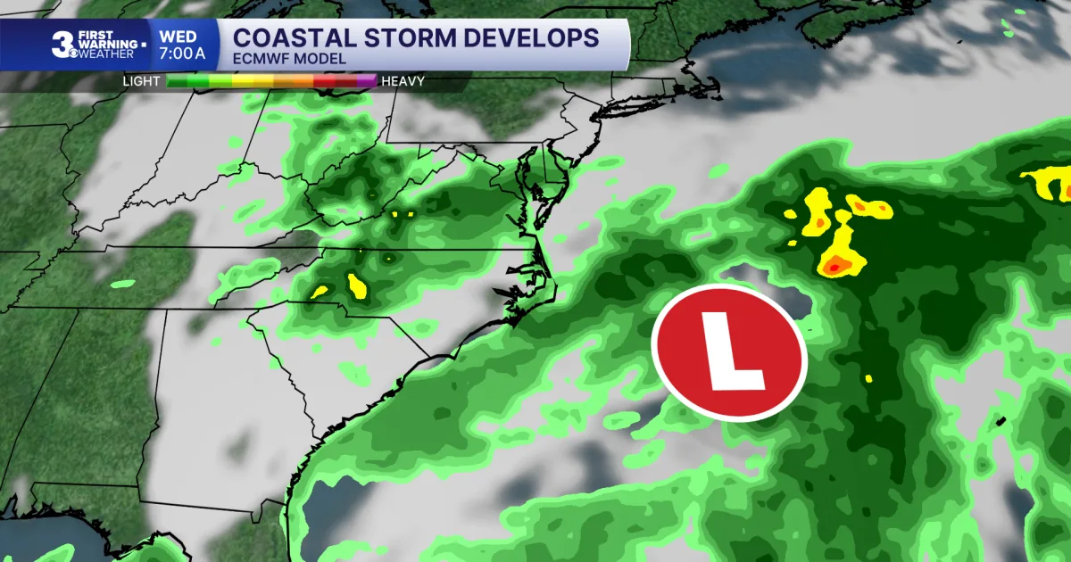 Rain clouds and rough coastal weather over Virginia shoreline during a windy storm forecast